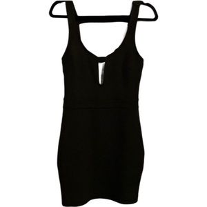 Free People bodycon tank dress. Strappy back and plunge neck size small